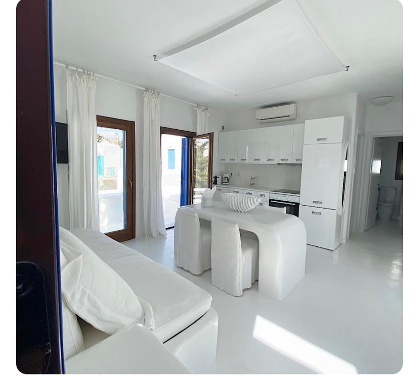 white luxury suite with shared pool downtown